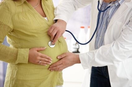 Pregnant woman at doctor checkup
