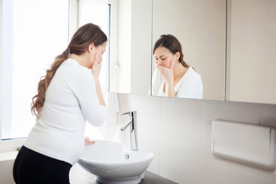 Pregnant woman in the bathroom