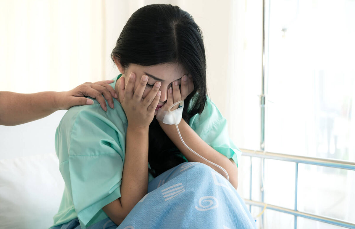 Woman having a miscarriage