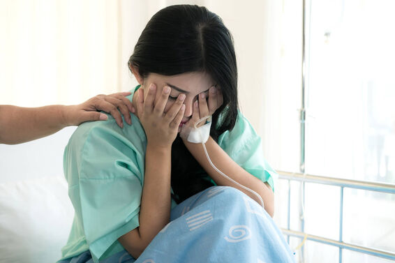Woman having a miscarriage