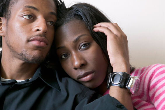 Sad young African American couple