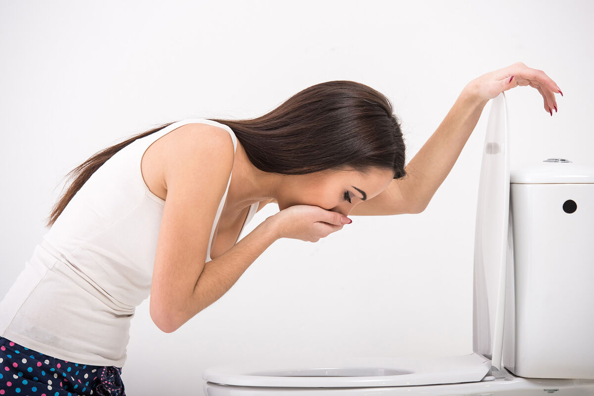 woman feeling nauseous