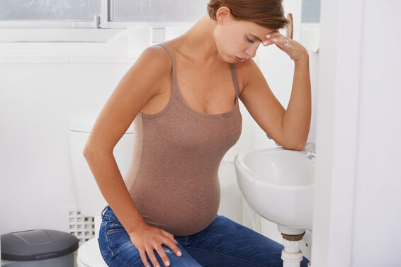 Woman experiencing morning sickness