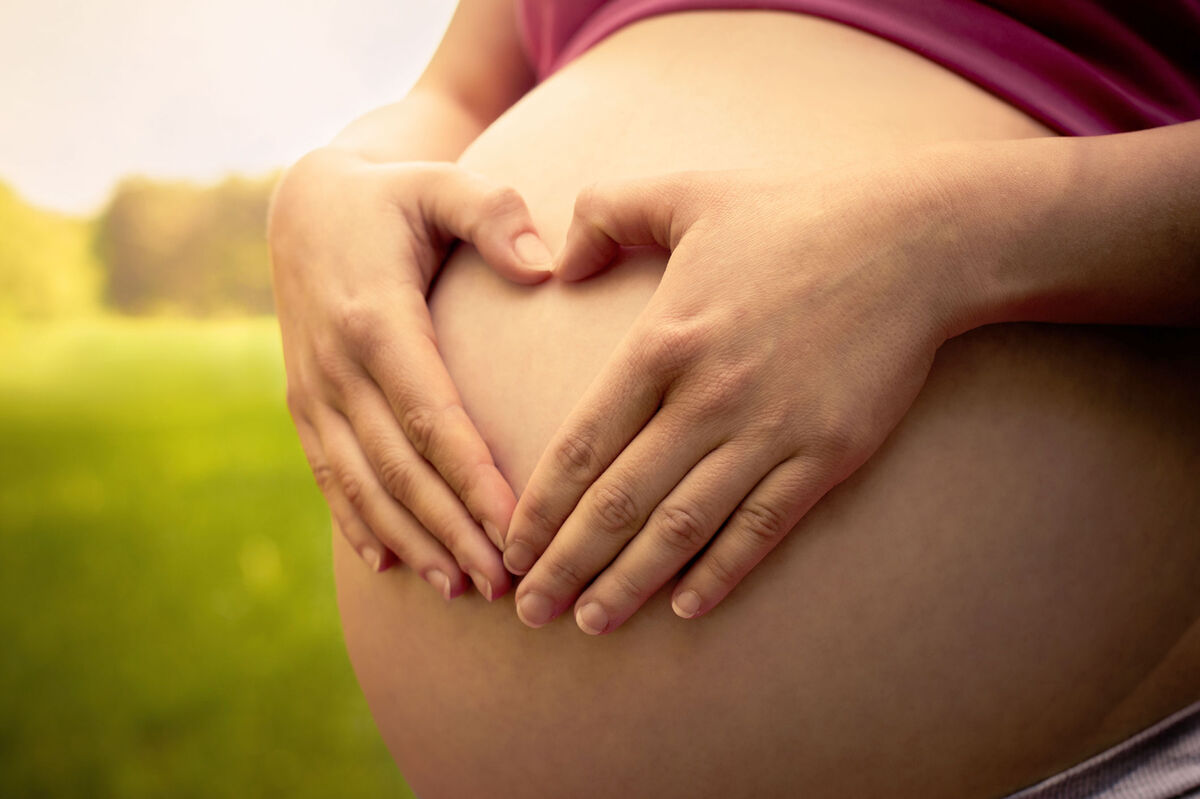 close-up of large pregnant belly
