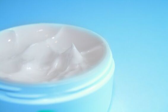Image of an open jar of eye cream