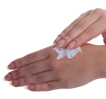 Rubbing homemade lotion into hands