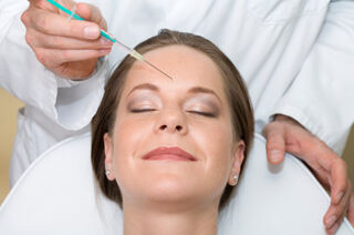 Woman undergoing Botox treatment Source: iStockphoto Permission: Licensed