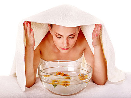 Woman steaming her face