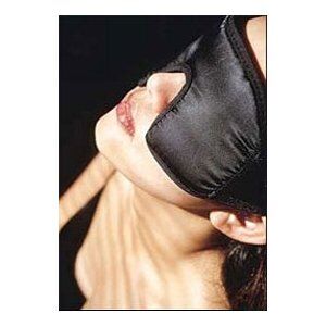 Woman using a magnetic face lift mask