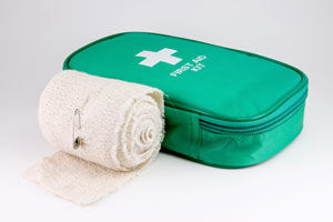 Bandage and first aid kit. Source: iStockphoto Permission: Licensed