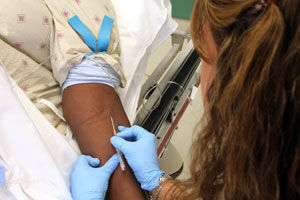 Patient getting IV. Source: iStockphotos Permission: Licensed