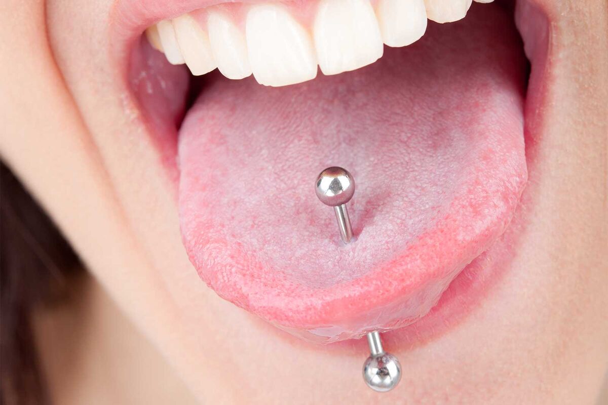 close up of barbell on pierced tongue