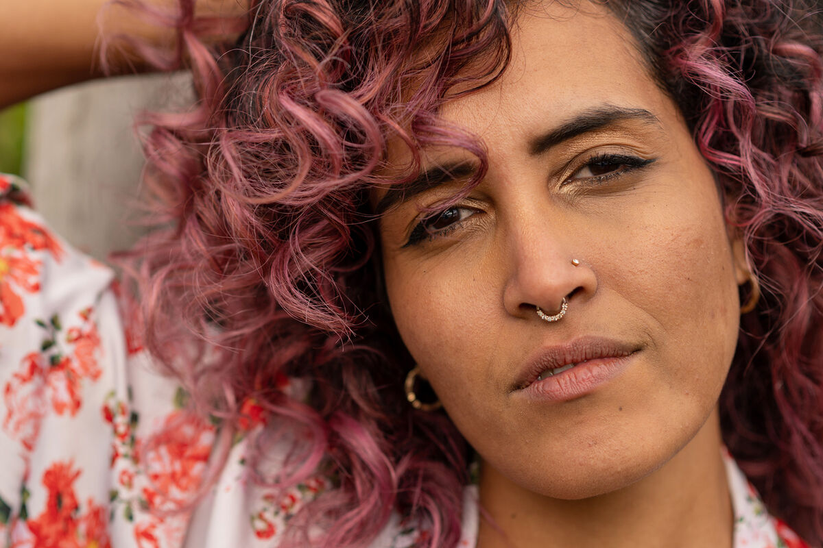 Woman With Nose Piercing and Colorful Hair