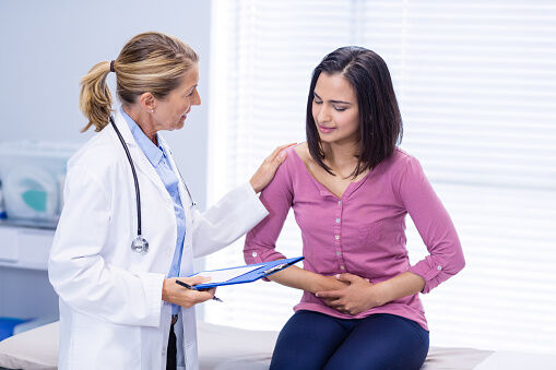 Patient suffering from stomach ache