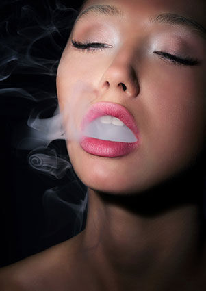Exhaling marijuana smoke