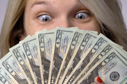 Woman with lots of money