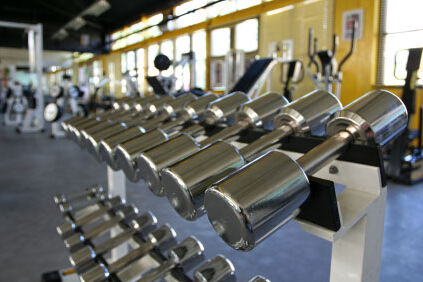 Image of a rack of barbells for strength training