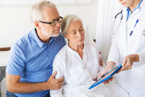 elderly patient with doctor