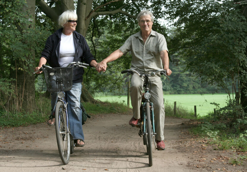 Senior couple biking