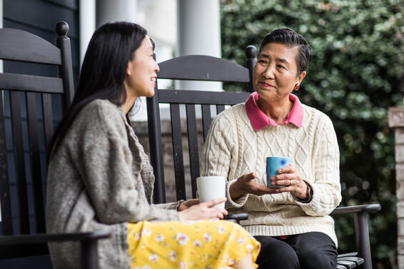 daughter spending time with elderly mother