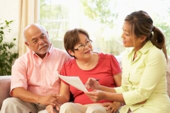 Seniors meeting with geriatric care consultant
