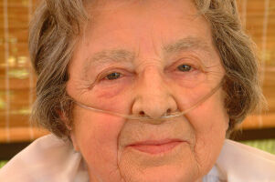 Elderly woman on oxygen