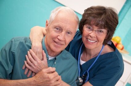 caregiver with elderly man
