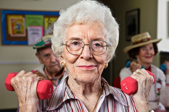 Senior woman doing bicep exercise