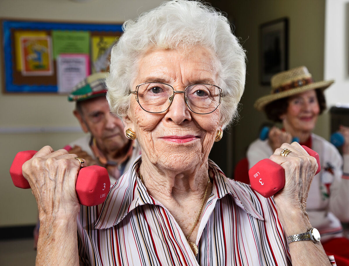 Senior woman doing bicep exercise