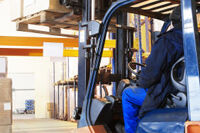 driver of a forklift loader at warehouse