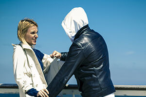 Woman warding off assailant