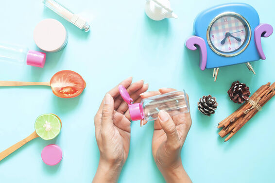 Woman Applying Hand Sanitizer