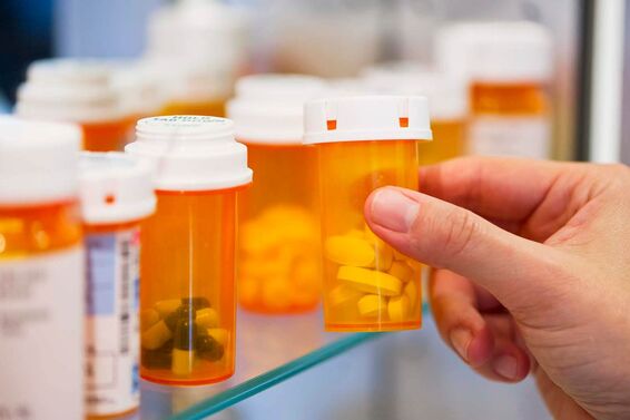 Pill bottles on shelf