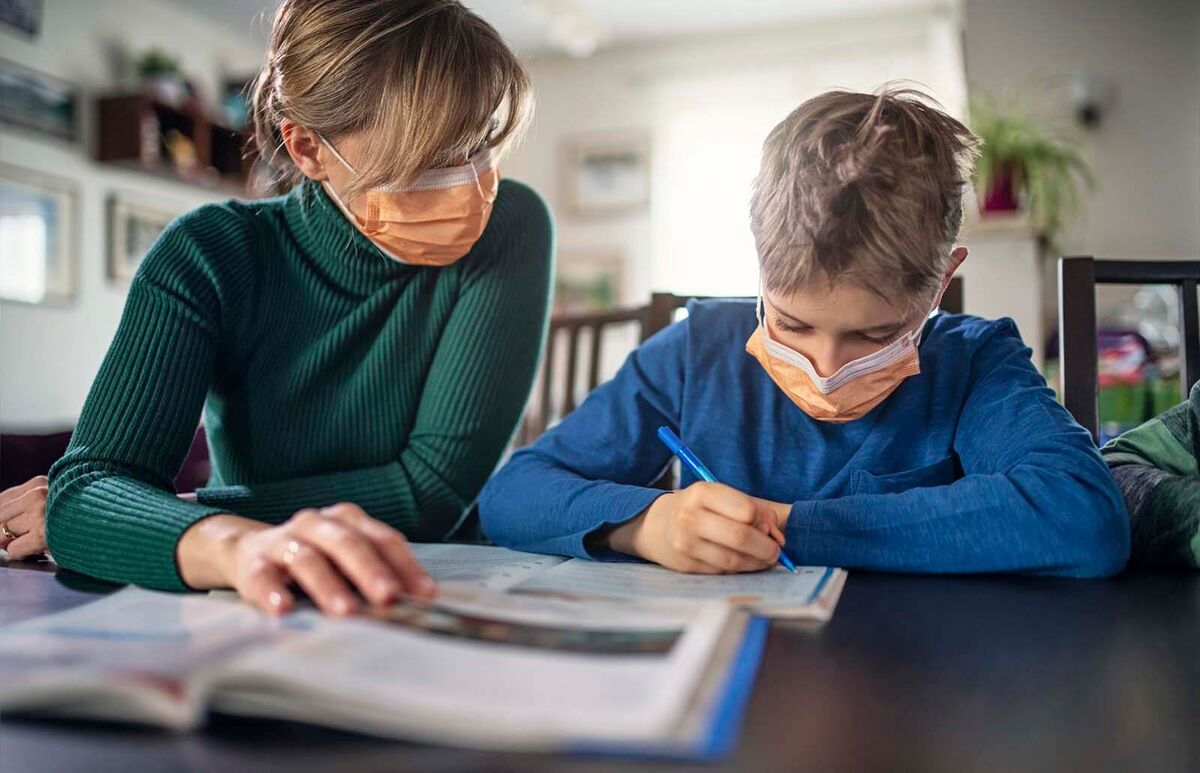 Mother and son wearing face masks