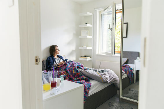 Woman in bed with the flu