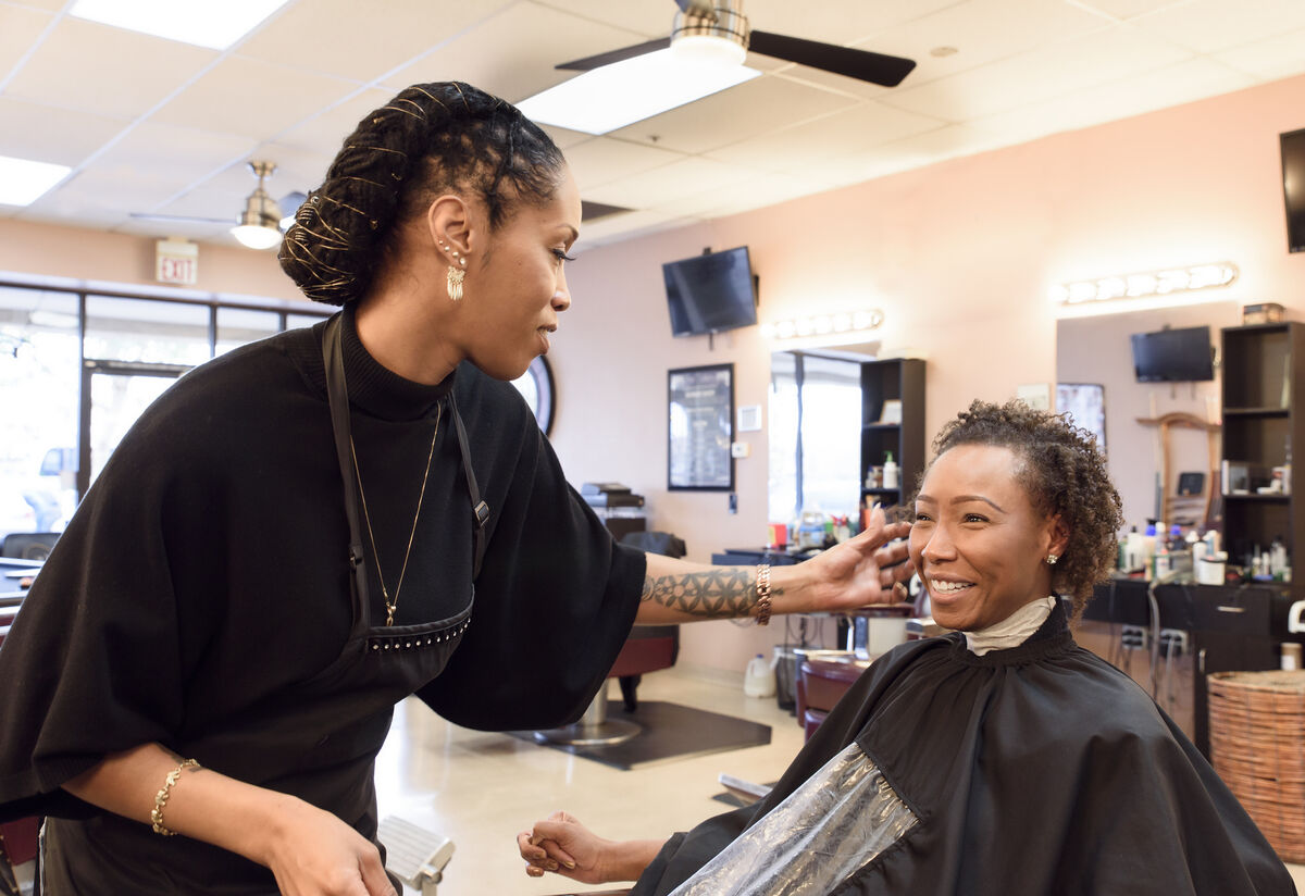 woman getting her hair done